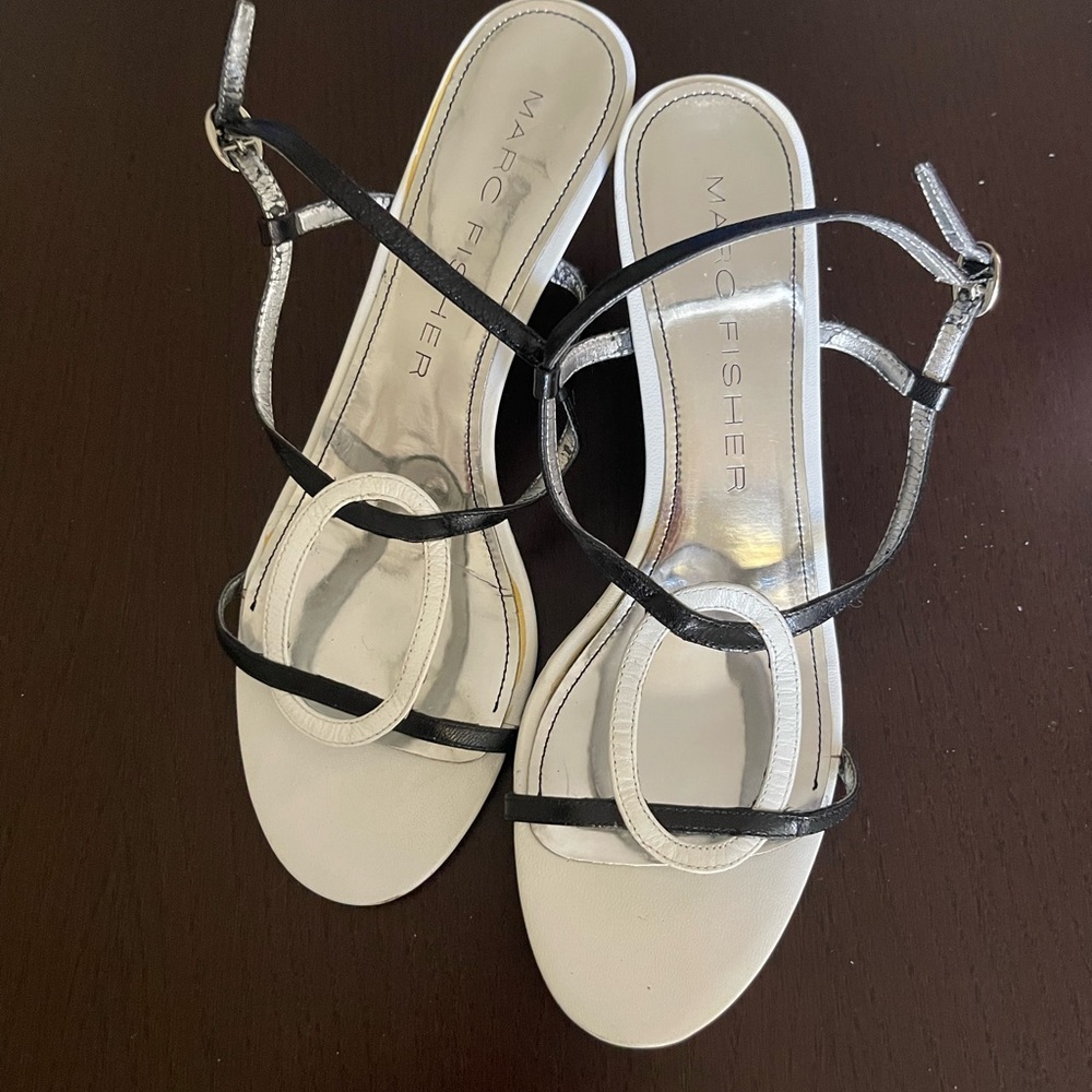 Marc Fisher sandals 7M black and white 3” heel. Adjustable strap. Very good shoe